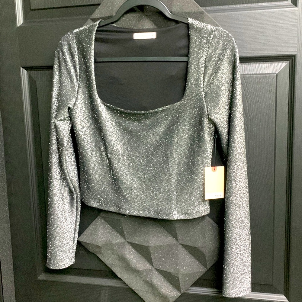 NEW WITH TAGS! Sincerely Jules shimmer gray shirt with long sleeves.